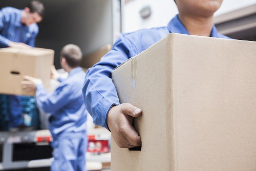 Removal team loading items safely during a man with van move