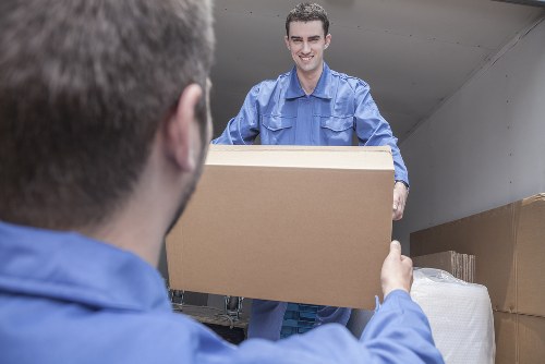 Moving van outside a residential property during a local removals job