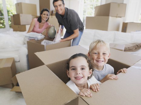 Local removal van with boxes and household items ready for transport