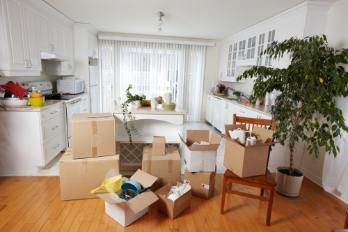 Local furniture removal crew managing access challenges and stairs
