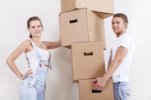 Packed boxes and furniture ready for transport during removals