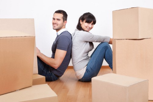 Staff trained in safe lifting during a house move