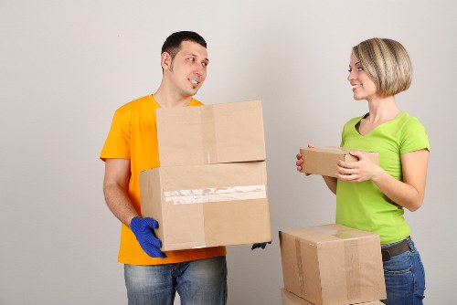 Local removals team loading belongings with attention to access and parking